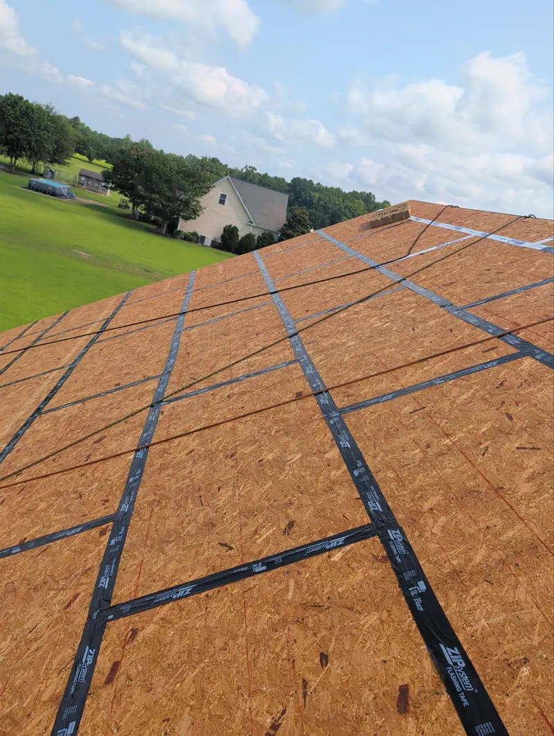 Roof deck with black tape sealing every panel seam
